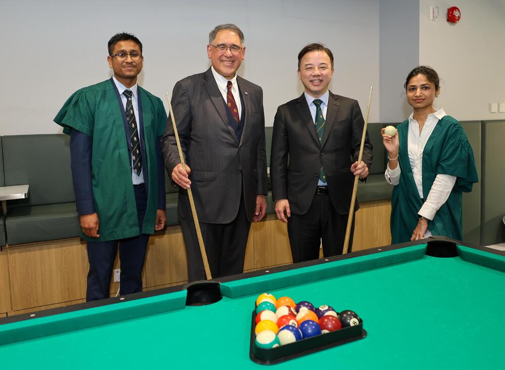 Guests tour the Jockey Club Student Village IV.