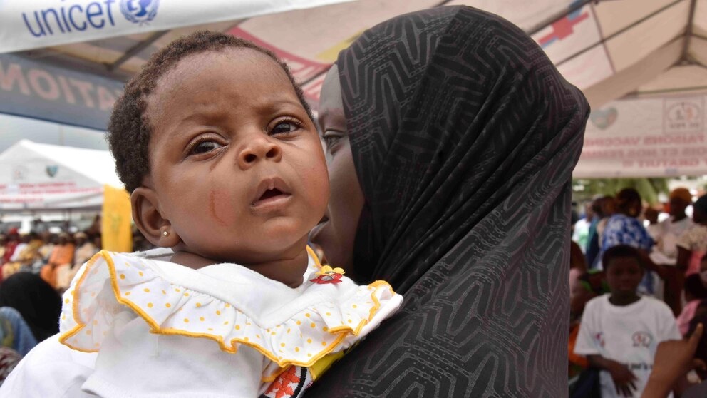 A woman waits to administer the malaria vaccine Oxford-Serum R21 to her child in Abidjan, Ivory Coast, Monday, July. 15, 2024. (AP Photo/Diomande Ble Blonde) A woman waits to administer the malaria vaccine Oxford-Serum R21 to her child in Abidjan, Ivory Coast, Monday, July. 15, 2024. (AP Photo/Diomande Ble Blonde)