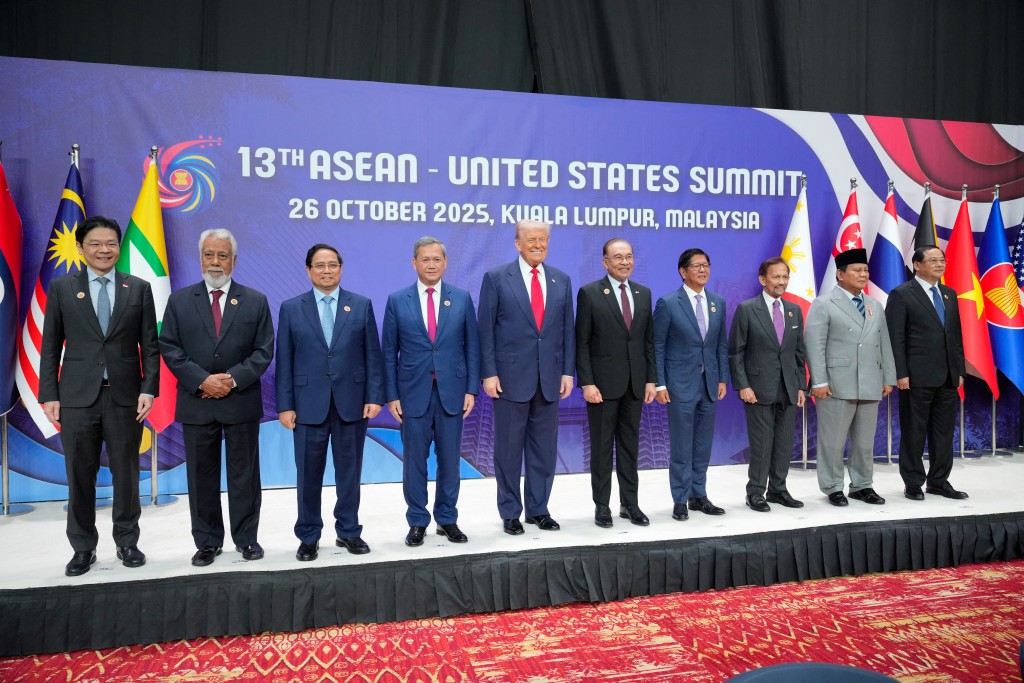 U.S. President Donald Trump poses with other leaders at the ASEAN Summit in Kuala Lumpur, Malaysia, October 26, 2025. (Reuters)