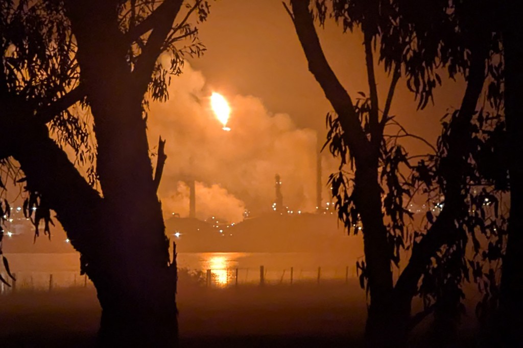 Photo by HANDOUT / GIULIANA ELAKIS / AFP This handout photo taken and released by Giuliana Elakis on April 16, 2026 shows a fire at the Viva Oil Refinery in Geelong.