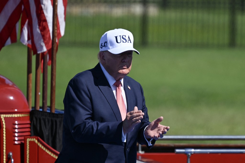 US President Donald Trump claps after speaking during a "Steel Across America" event ahead of the 25th anniversary of the September 11th attacks on the Ellipse near the White House on September 8, 2026 in Washington, DC. (Photo by Alex WROBLEWSKI / AFP)