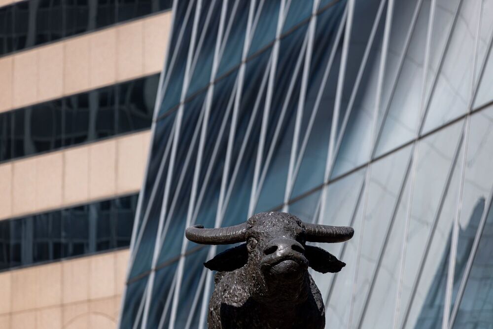 A sculpture of a water buffalo outside the Exchange Square complex, which houses the Hong Kong Stock Exchange, in Hong Kong. (Bloomberg) A sculpture of a water buffalo outside the Exchange Square complex, which houses the Hong Kong Stock Exchange, in Hong Kong. (Bloomberg)