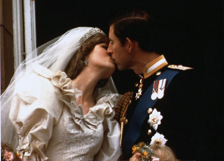 Prince Charles kisses his bride Diana on their wedding day, July 29, 1981. REUTERS/File. 