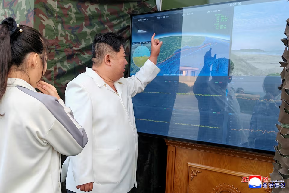 North Korean leader Kim Jong Un, accompanied by his daughter Kim Ju Ae, attends a test of a new type of weapon at an undisclosed location, North Korea, September 20, 2026, in this picture released by North Korea's official Korean Central News Agency. KCNA via REUTERS