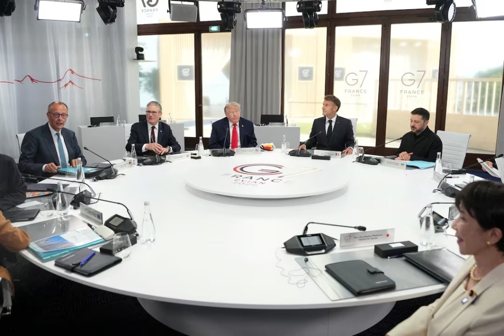 German Chancellor Friedrich Merz, British Prime Minister Keir Starmer, U.S. President Donald Trump, French President Emmanuel Macron, Ukrainian President Volodymyr Zelenskyy and Japan’s Prime Minister Sanae Takaichi during a working session at the G7 summit in Evian-les-Bains, France, June 16, 2026. Thibault Camus/Pool via REUTERS/File Photo