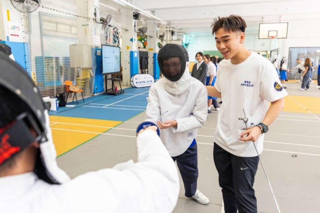 Students have the opportunity to wear fencing gear while learning the sport's fundamental concepts and basic skills. Students have the opportunity to wear fencing gear while learning the sport's fundamental concepts and basic skills.