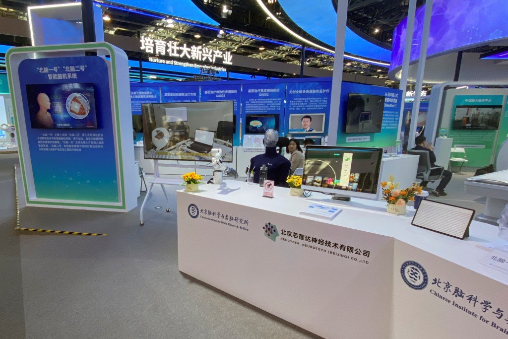 Chinese Institute for Brain Research, Beijing and NeuCyber Neurotech (Beijing) Co. Ltd host a booth displaying their brain chips at the Zhongguancun Forum in Haidian district, Beijing, China March 31, 2025. REUTERS/Eduardo Baptista