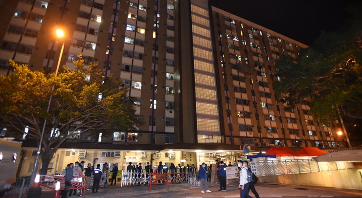 Government officers lock down the building at around 7pm Thursday. 