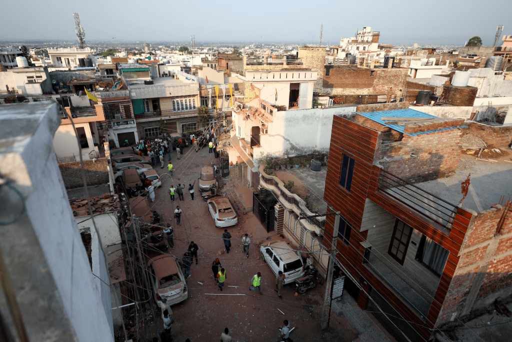 Damaged vehicles are seen in the neighbourhood, following Pakistan's military operation against India, in Rehari, Jammu, May 10, 2025. REUTERS/Stringe