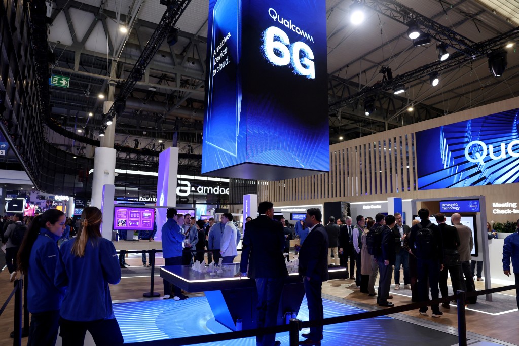 A picture taken on March 2, 2026 in Barcelona shows Qualcomm's stand adverstising 6G technology during the inauguration of the Mobile World Congress (MWC), the world's biggest mobile technology showcase and fair. (AFP)
