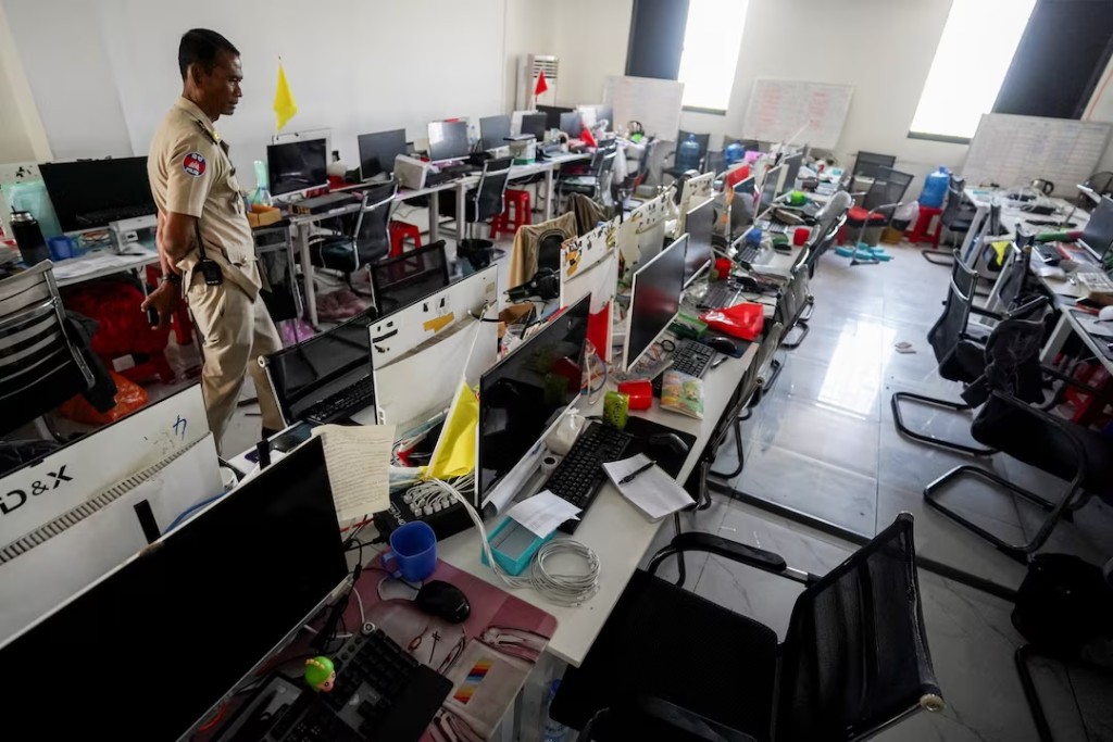 A police officer inspects inside a scam compound known as "My Casino" used for fraud operations, which police said was owned by former tycoon and casino owner Ly Kuong, who was arrested on January 15 and charged with illegal recruitment for exploitation, aggravated fraud and links to organised crime, in Kampot province, Cambodia, February 10, 2026. REUTERS/Soveit Yarn 