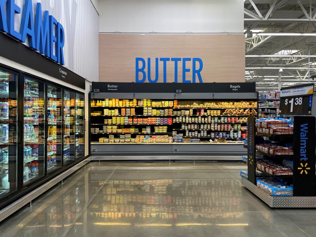  View of an aisle with new signage at Walmart's newly remodeled Supercenter, in Teterboro, New Jersey, U.S., June 7, 2023. REUTERS/Siddharth Cavale/File Photo