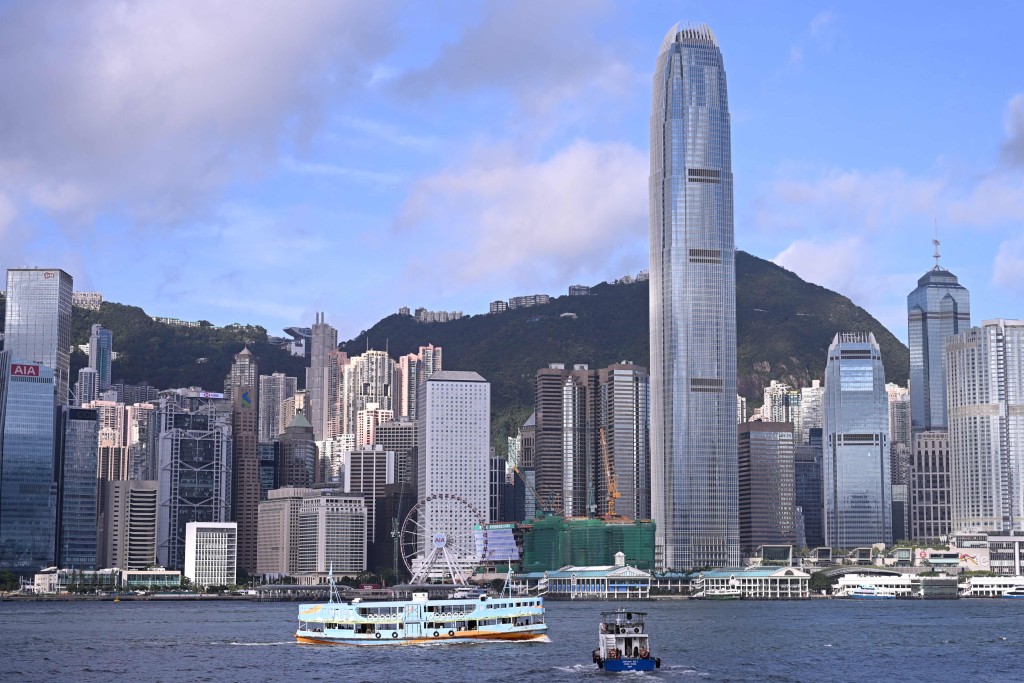 This photo taken on July 1, 2026 shows the Hong Kong skyline in Victoria Harbor, as seen from Kowloon. Photo by Peter PARKS /AFP