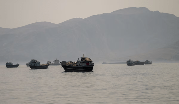 Vessels are anchored in the Strait of Hormuz, as seen from Musandam, Oman, June 19, 2026. REUTERS/Stringer 
