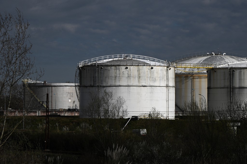 Fuel storage tanks are pictured at the CCMP (Compagnie Commerciale de Manutention Petroliere) petroleum depot in Pauillac, north of Bordeaux, south-western France, on March 10, 2026. (AFP)