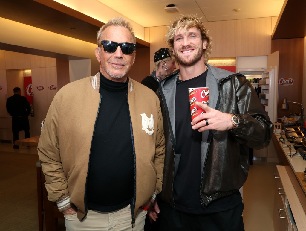 Kevin Costner and Logan Paul attend as Raising Cane's owner and founder Todd Graves hosts celebrity friends for Super Bowl LX at Levi Stadium in Santa Clara at Levi's Stadium on February 08, 2026 in Santa Clara, California. Phillip Faraone/Getty Images for Raising Cane's/AFP