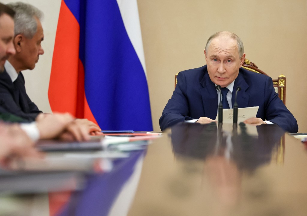 In this pool photograph distributed by the Russian state agency Sputnik, Russia's President Vladimir Putin chairs a meeting of the military-industrial commission in Moscow on September 18, 2026. (Photo by Vyacheslav PROKOFYEV / POOL / AFP)