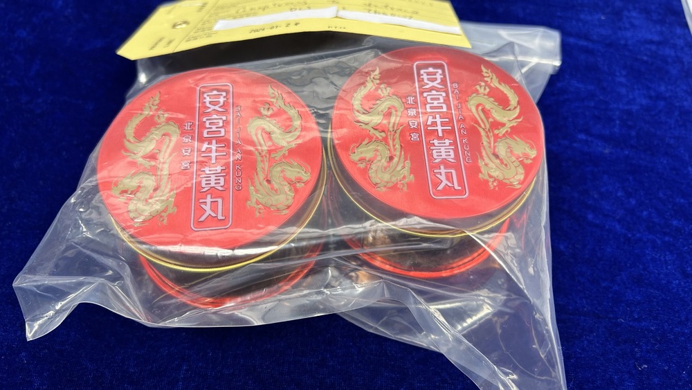 Chan Yu-wing and Chan Kwong-hei at the briefing. Inset: one of the medicines that are sold at inflated prices. Chan Yu-wing and Chan Kwong-hei at the briefing. Inset: one of the medicines that are sold at inflated prices.