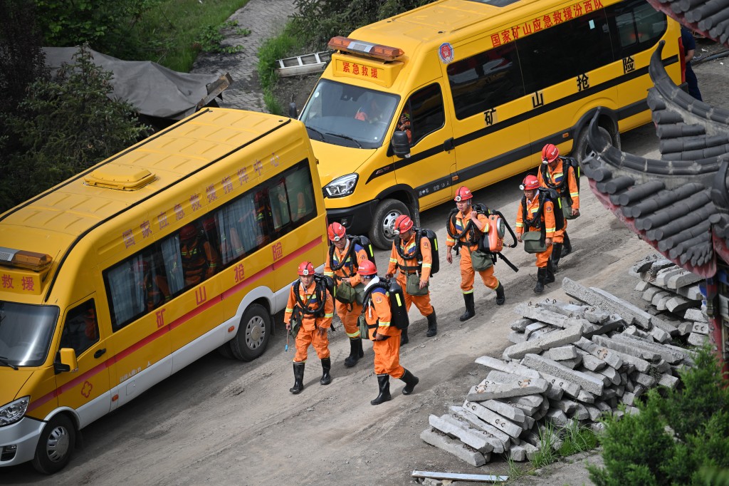 Rescue workers arrive to carry out rescue operations following a gas explosion at the Liushenyu coal mine in Changzhi, in northern China's Shanxi province on May 23, 2026. (AFP)