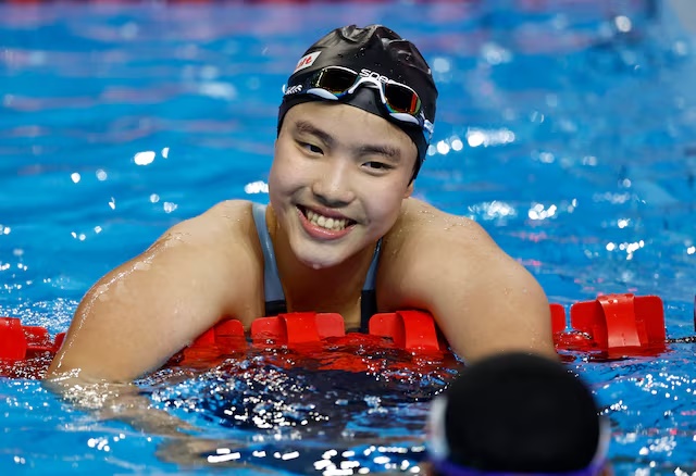 Swimming - World Aquatics Championships - Women 400m Medley - World Aquatics Championships Arena, Singapore - August 3, 2025 China's Zidi Yu reacts at the end of heat 2 REUTERS/Tingshu Wang/File Photo
