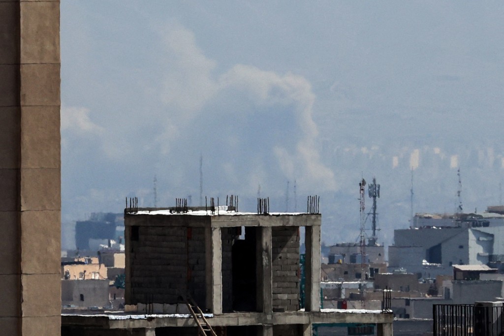 A plume of smoke rises after a strike on the Iranian capital Tehran on March 4, 2026. (AFP)