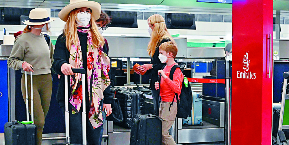 Expatriates head for a flight out of Hong Kong on Sunday as the fifth wave rages on. Expatriates head for a flight out of Hong Kong on Sunday as the fifth wave rages on.