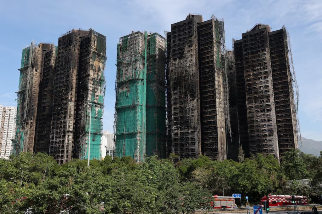 The charred buildings of Wang Fuk Court housing complex following a deadly fire, in Tai Po, Hong Kong, China, November 28, 2025. REUTERS/Tyrone Siu