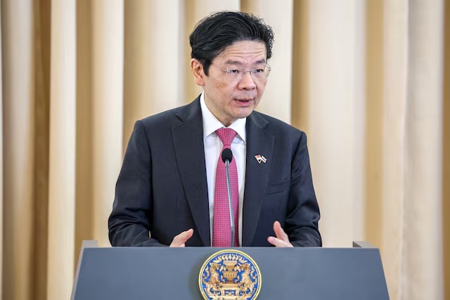 Singapore's Prime Minister Lawrence Wong speaks during a signing ceremony and press conference at the Government House, in Bangkok, Thailand, November 28, 2024. REUTERS/Athit Perawongmetha/File Photo 