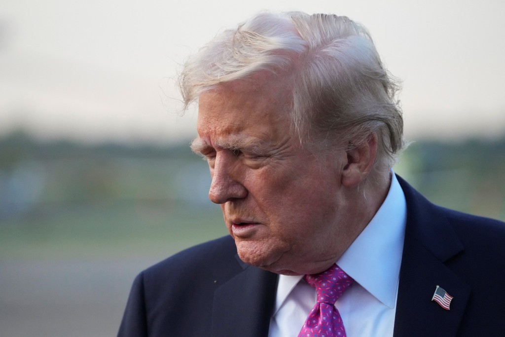 U.S. President Donald Trump speaks to the media before boarding Air Force One to depart for Washington, at Morristown Municipal Airport in Morristown, New Jersey, U.S., September 14, 2025. REUTERS/Ken Cedeno