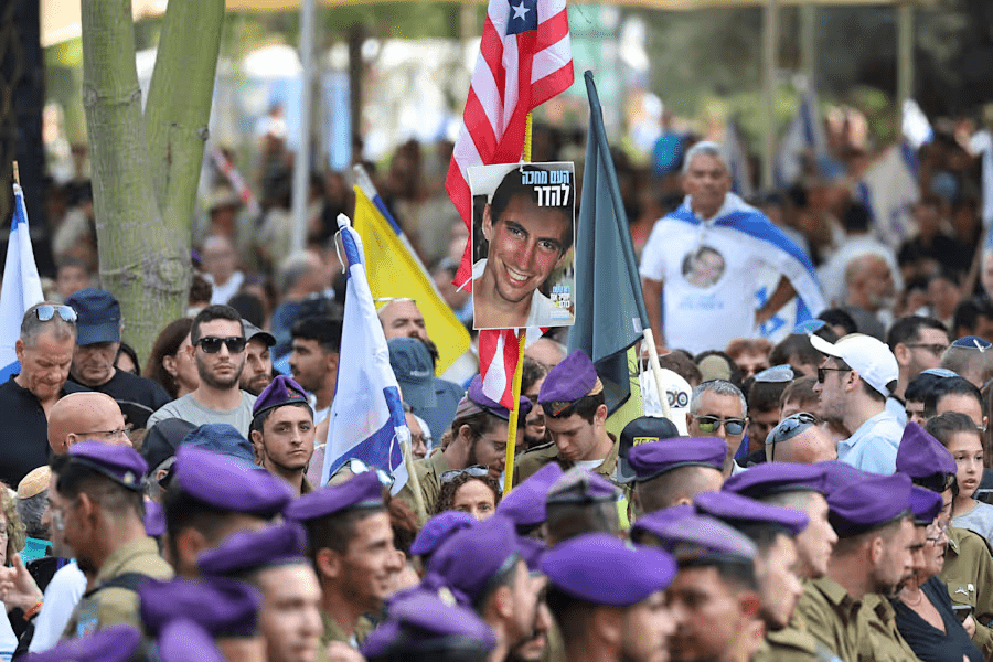 Israeli soldiers attend the funeral of Hadar Goldin, an Israeli soldier killed in Gaza in 2014 and whose body had been held there until it was released Sunday, in Kfar Saba, Israel, Tuesday, Nov. 11, 2025. (Abir Sultan/Pool via AP) (Abir Sultan)