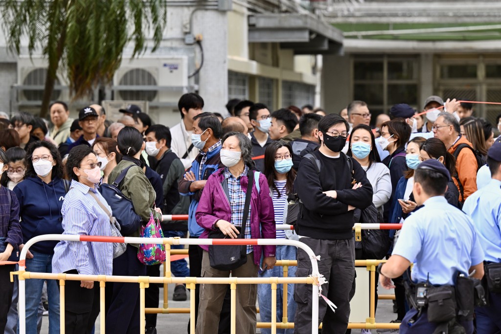Residents streamed into a community hall to identify victims through photographs provided by authorities.