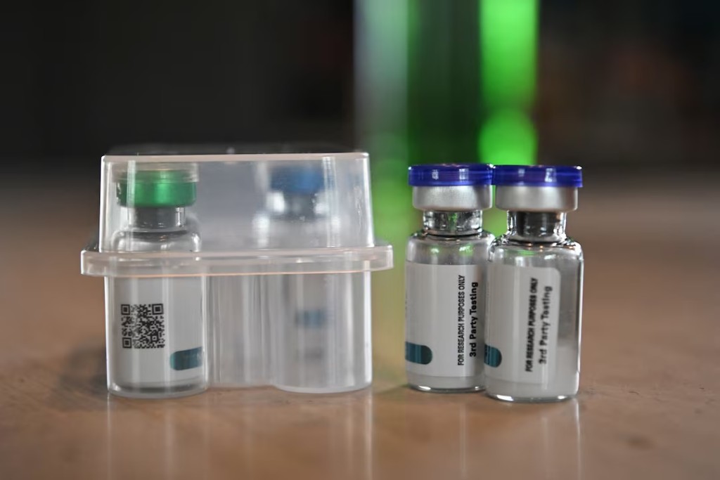 Vials containing components of obesity drugs, which were purchased through the grey market, a new market that allows consumers to purchase obesity medication materials from China and reconstitute them into injectable drugs, sit on a kitchen counter at the home of Amy Spencer in West Plains, Missouri, U.S. April 24, 2025. REUTERS/Callaghan O'Hare