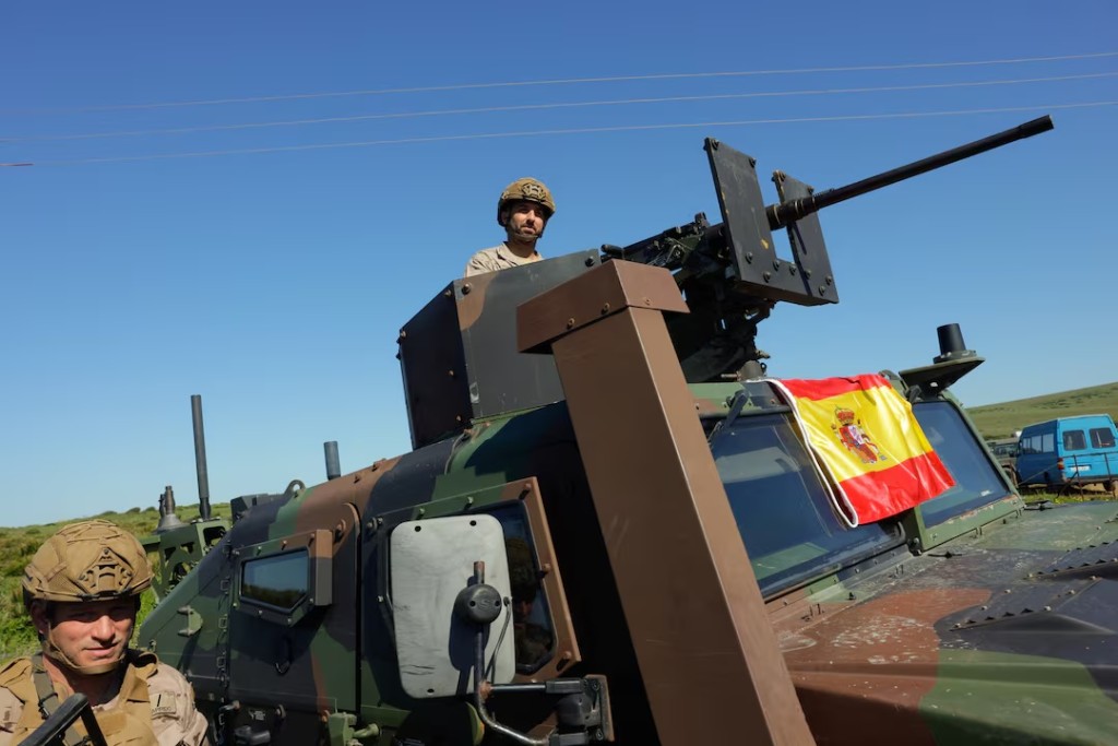 Spanish soldiers take part in Exercise Dynamic Mariner 25 military drill training, which involves naval forces from several NATO members, at Retin beach, in the Atlantic Ocean, in Barbate, Spain, March 28, 2025. REUTERS/Jon Nazca