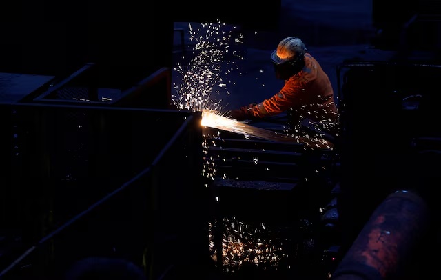 A worker works at the British Steel site in Scunthorpe, Lincolnshire, Britain April 17, 2025. Danny Lawson/Pool via REUTERS/File Photo
