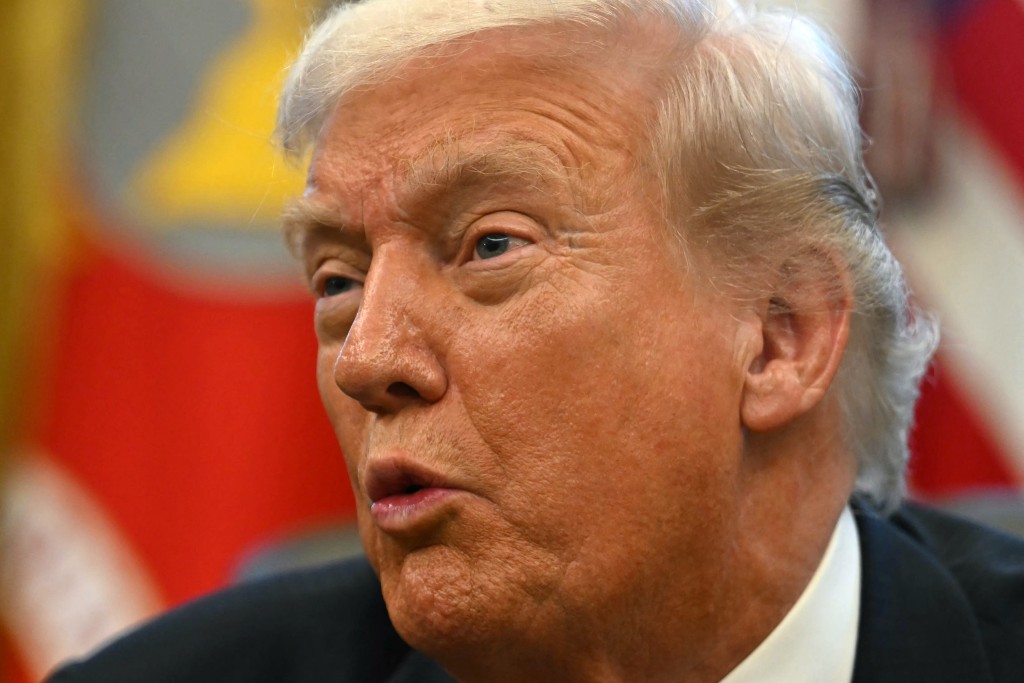 US President Donald Trump meets with New York Mayor-elect Zohran Mamdani (out of frame) in the Oval Office at the White House in Washington, DC, on November 21, 2025. (Photo by Jim WATSON / AFP)