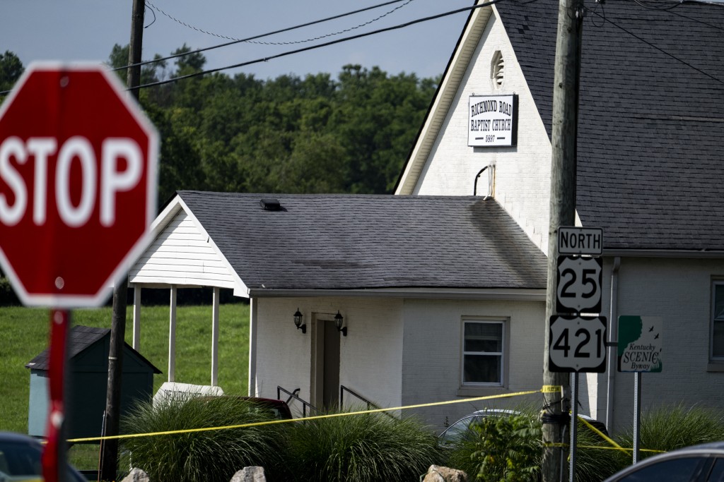 Police assess the scene after a shooting at Richmond Road Baptist Church on July 13, 2025 in Lexington, Kentucky. (AFP)