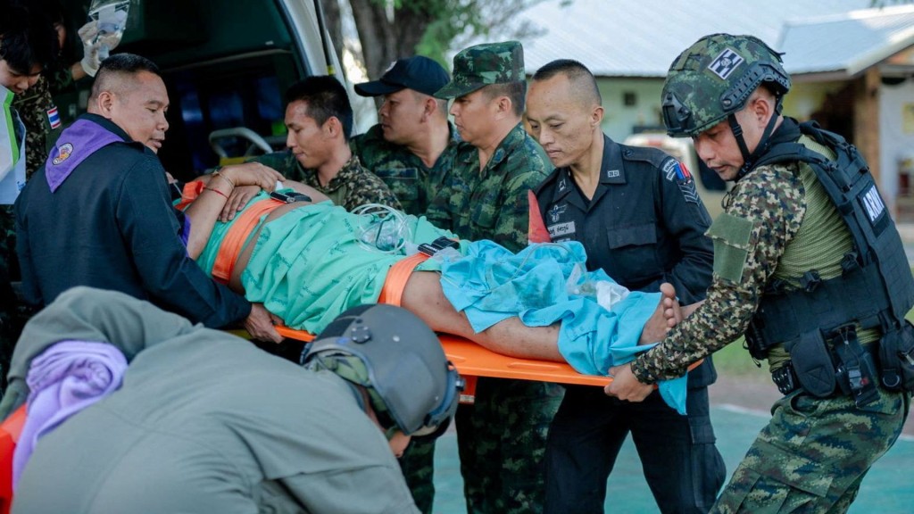 An injured soldier is transferred to a hospital following a clash between Thai and Cambodian troops. Reuters