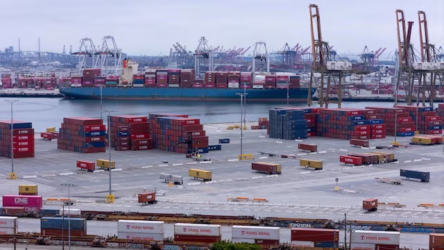 A drone view shows shipping containers from China at the Port of Los Angeles, in San Pedro, California, U.S., May 1, 2025. REUTERS/Mike Blake/File Photo