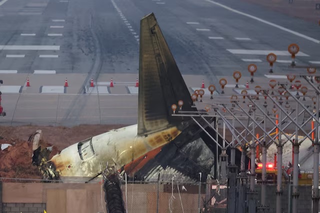 The wreckage of the Jeju Air aircraft that went off the runway and crashed lies at Muan International Airport, in Muan, South Korea, December 30, 2024. (REUTERS/Kim Hong-Ji/File Photo)