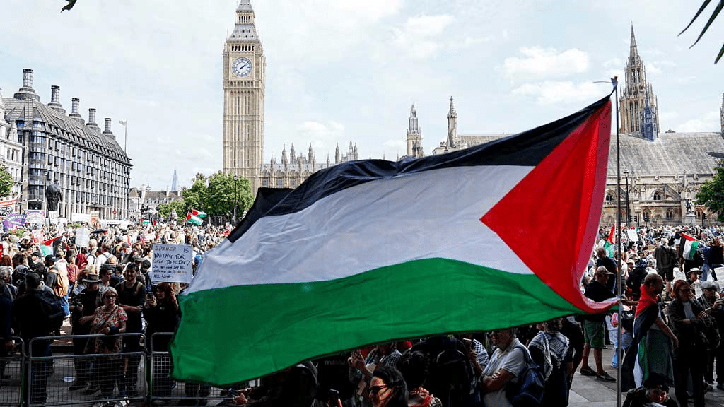 A Palestinian flag flutters as demonstrators attend the "Lift The Ban" rally organised by Defend Our Juries, challenging the British government's proscription of "Palestine Action" under anti-terrorism laws, in Parliament Square, in London, Britain, September 6, 2025. REUTERS