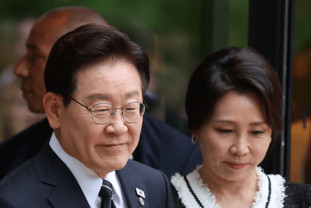 South Korea's President Lee Jae-myung and South Korea's first lady Kim Hea Kyung arrive before a family photo prior to a gala dinner as part of the G7 summit in Evian-les-Bains, France, June 16, 2026. Ludovic Marin/Pool via REUTERS