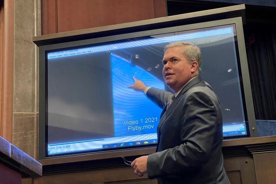 Deputy Director of U.S. Naval Intelligence Scott Bray points to a video of a 'flyby' as he testifies before a House Intelligence Counterterrorism, Counterintelligence, and Counterproliferation Subcommittee hearing about 'Unidentified Aerial Phenomena.” (Reuters) Deputy Director of U.S. Naval Intelligence Scott Bray points to a video of a 'flyby' as he testifies before a House Intelligence Counterterrorism, Counterintelligence, and Counterproliferation Subcommittee hearing about 'Unidentified Aerial Phenomena.” (Reuters)