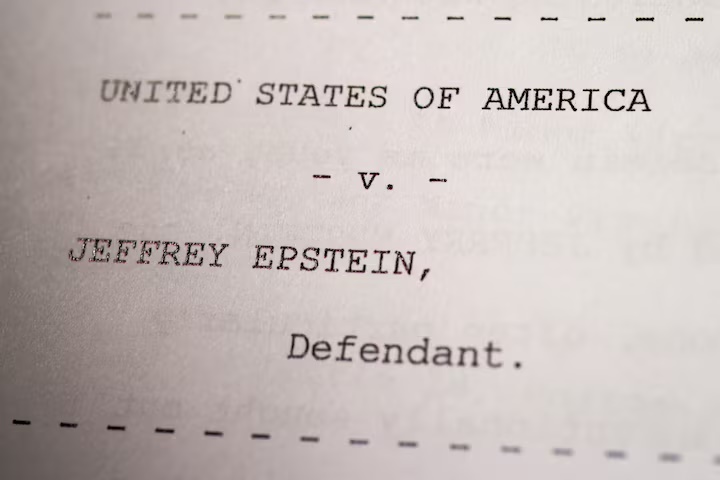 Newly-released document from disgraced late financier and sex offender Jeffrey Epstein, referencing court cases against him, is seen in this handout released by the U.S. Justice Department and printed and arranged for a photograph by Reuters in Washington, D.C., U.S., December 19, 2025. REUTERS/Jonathan Ernst