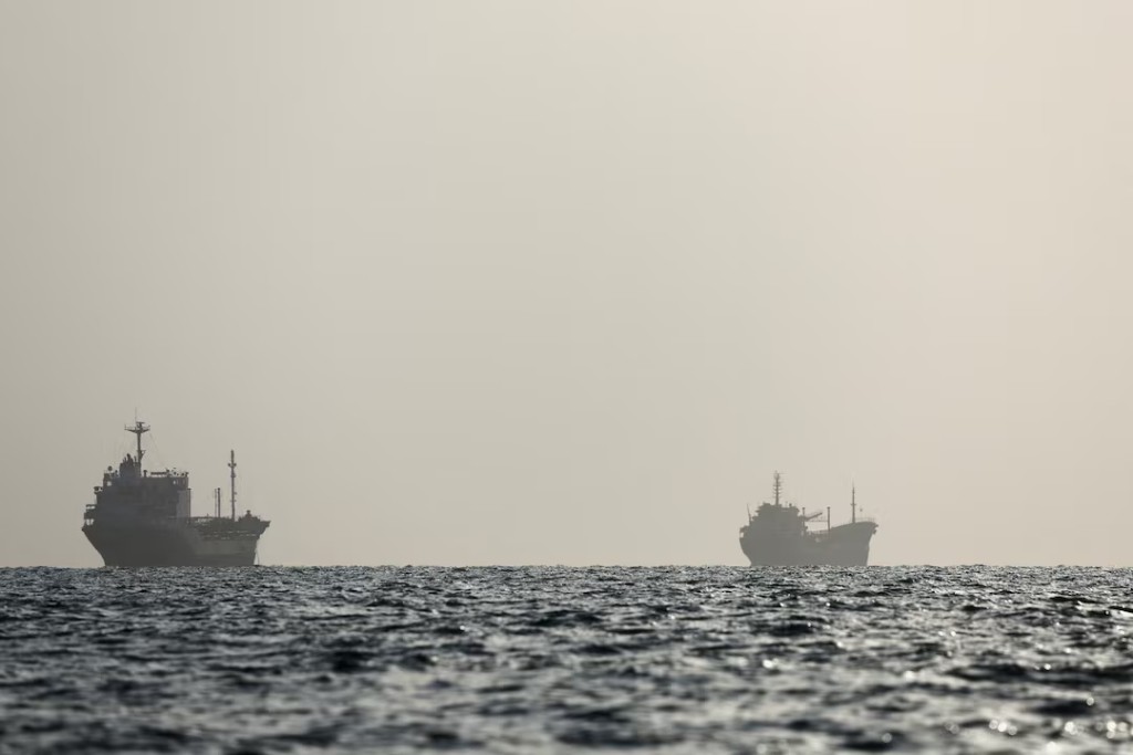  Vessels in the Strait of Hormuz are visible near the beach of Bandar Abbas, Iran, August 27, 2026. Majid Asgaripour/WANA (West Asia News Agency) via REUTERS
