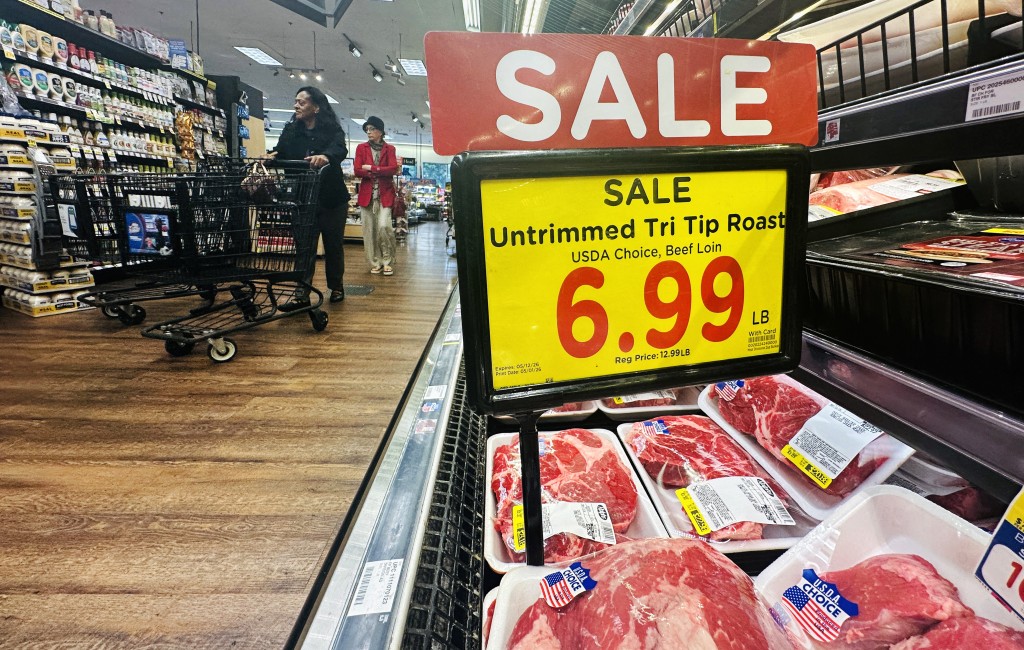 Photo by FREDERIC J. BROWN / AFP  People shop in a supermarket in Alhambra, California on May 12, 2026.