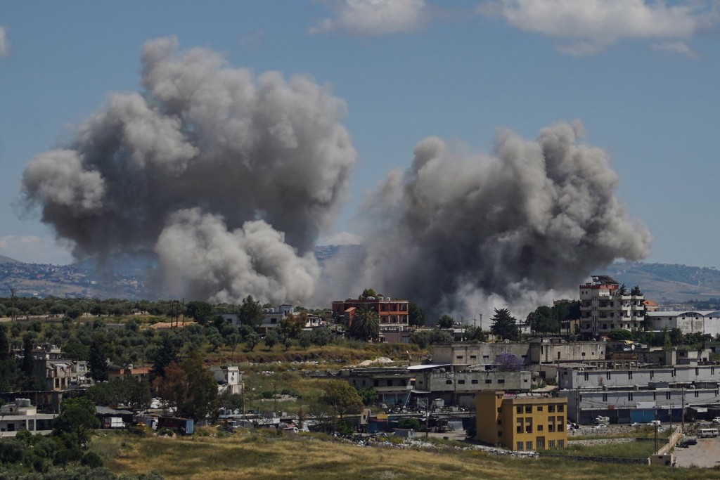 Smoke rises following an Israeli strike on the southern village of Nabatieh on May 24, 2026. (AFP)