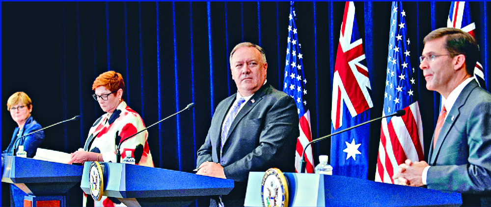 US Defense Secretary Mark Esper speaks during a news conference in Washington while, from left, defense chief Linda Reynolds and Foreign Minister Marise Payne of Australia and Mike Pompeo listen. Inset: Wilson Wong. REUTERS US Defense Secretary Mark Esper speaks during a news conference in Washington while, from left, defense chief Linda Reynolds and Foreign Minister Marise Payne of Australia and Mike Pompeo listen. Inset: Wilson Wong. REUTERS