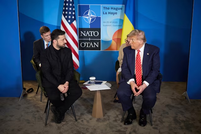 U.S. President Donald Trump and Ukraine's President Volodymyr Zelenskiy attend a meeting on the sidelines of NATO summit in The Hague, Netherlands June 25, 2025. Ukrainian Presidential Press Service/Handout via REUTERS/File Photo 