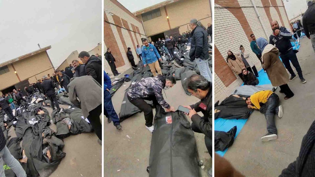 Bodies lie in body bags on the ground as people stand amid the scene outside Kahrizak Forensic Medical Centre in Tehran. Reuters