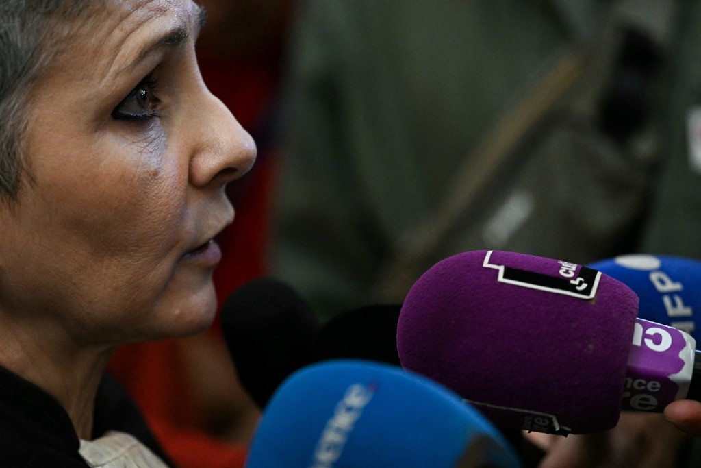 Beatrice Zavarro, lawyer of defendant Dominique Pelicot, speaks to the press during the appeal trial in the Mazan rape case at the Nimes courthouse, in Nimes, southern France, on October 7, 2025.  (Photo by Gabriel BOUYS / AFP)